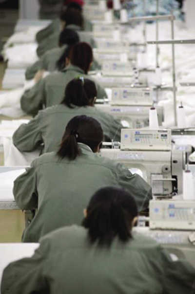 外企到华集体沦为"血汗工厂" 1个月加班113小时(组图)