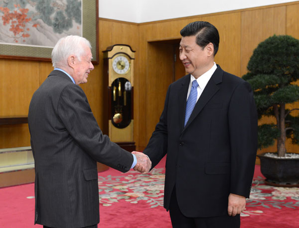 12月13日，中共中央总书记习近平在北京中南海会见美国前总统卡特。新华社记者 马占成
