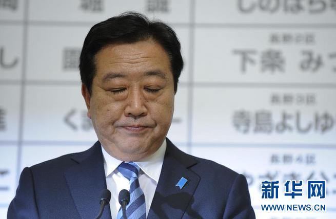 12月16日，在位于日本东京的自民党总部，自民党总裁安倍晋三对选举发表感想。新华社记者马平摄