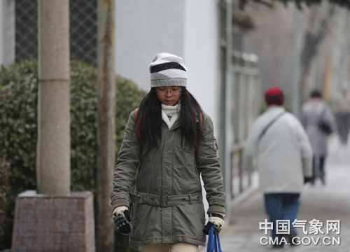 2013年1月15日，北京迎来新年第一场雪。庄白羽摄影