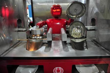 哈尔滨机器人餐厅 炒菜送餐全机器人服务(图)