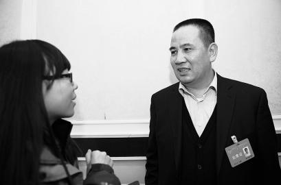 梁文海接受本报记者采访 本报记者寇宁摄