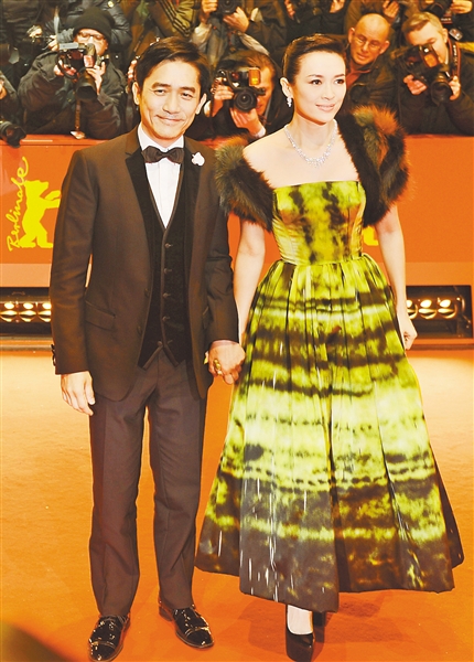 2月7日,电影《一代宗师》演员梁朝伟(左)与章子怡亮相柏林电影节开幕