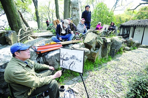 在沧浪亭开始了为期3天的采风写生活动,并与苏州画家进行了一场南北