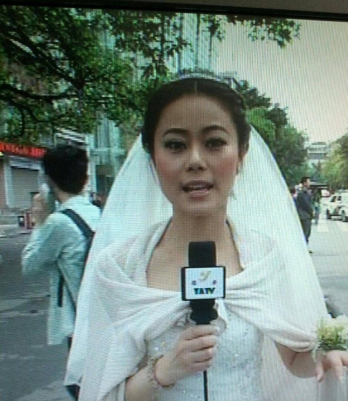 雅安电视台记者穿婚纱_雅安电视台女记者穿婚纱报道地震