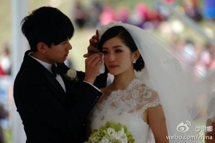 何炅.婚纱照_何炅老婆王菁婚纱照(2)