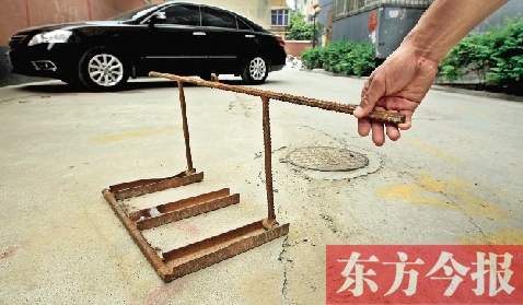 郑州一小区居民上锁停车位 影响消防通道通行