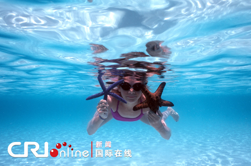 菲律宾在北京推广潜水活动 菲注册潜水基地多