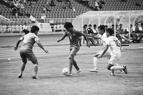 新疆足球队在全运会比赛中。CFP供图