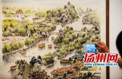 昨天上午,《运河情·扬州梦—邹文灿国画摄影作品展》在扬州