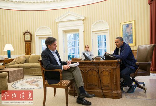 11月23日,在美国首都华盛顿白宫椭圆形办公室,美国总统奥巴马(右)就伊