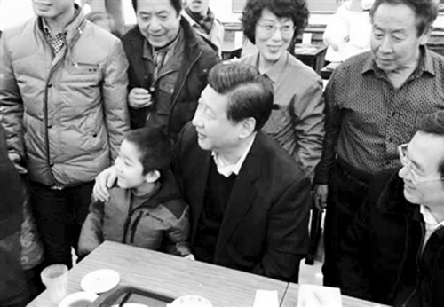 习近平与小袁宝的合影(网络图片)