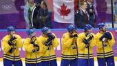 图文：加拿大队获男子冰球冠军 瑞典队表情失落