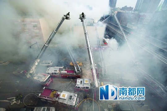 纽约两建筑爆炸坍塌多人死伤或因煤气泄漏