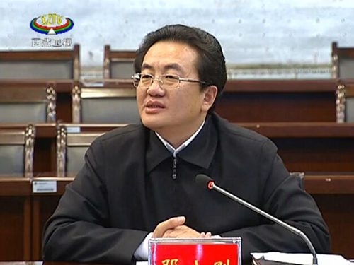 区党委副书记、自治区常务副主席、区党委政法委书记邓小刚。