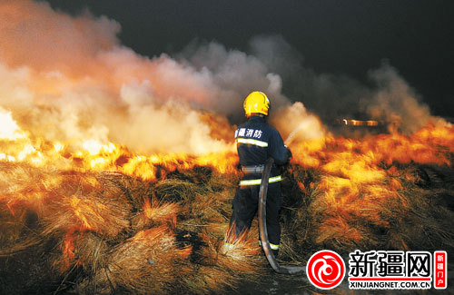 乌鲁木齐市米东区一工厂起火 消防人员救援10小时(图)