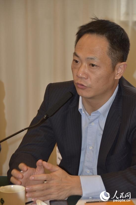中国军控与裁军协会秘书长陈凯主持会议 摄影:人民网 杨铁虎