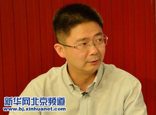 北京市医院管理局医疗护理处处长谷水在访谈现场。新华网北京频道发,骆璐摄