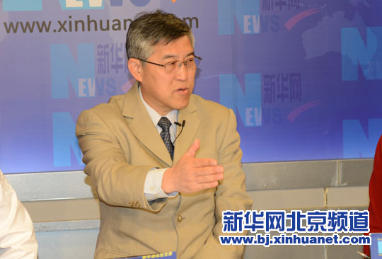 王晨在访谈中。新华社北京频道发 洪轩