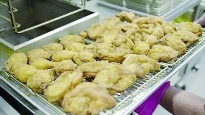 肯德基作为英国最受欢迎的快餐连锁店,平均每分钟就销售近400块鸡肉.