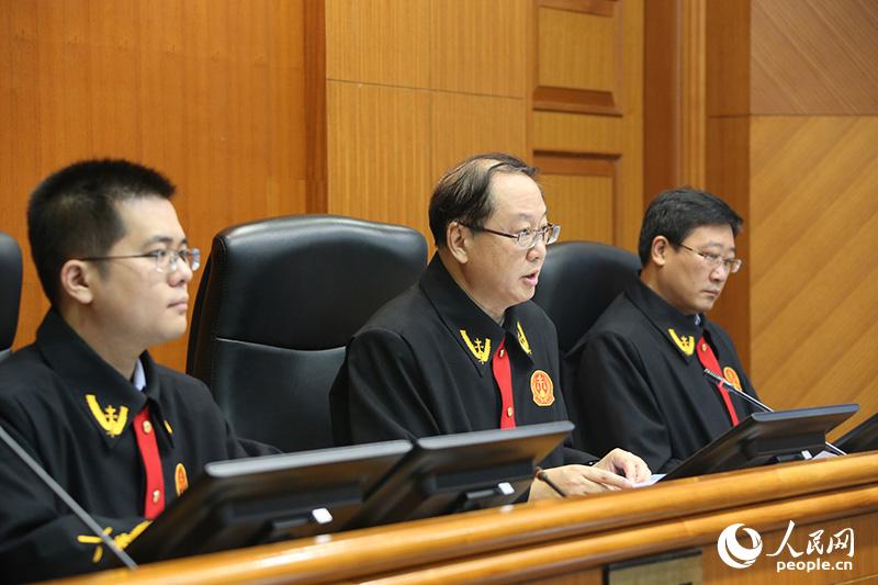沈培平在法庭上。北京市第一中级人民法院供