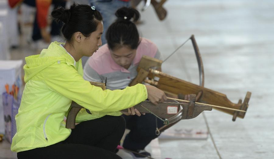 (民族运动会(1)射弩—民族传统弩女子立姿决赛赛况(图)