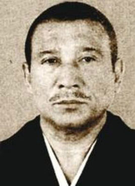 司忍,本名筱田建市