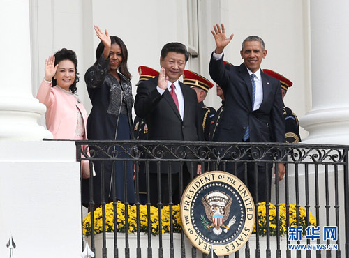 9月25日，中国国家主席习近平在华盛顿白宫南草坪出席美国总统奥巴马举行的欢迎仪式。 新华社记者 庞兴雷 摄
