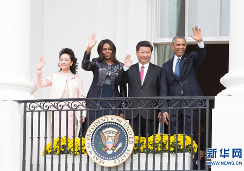 9月25日，中国国家主席习近平在华盛顿白宫南草坪出席美国总统奥巴马举行的欢迎仪式。 新华社记者黄敬文摄