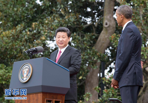 9月25日，中国国家主席习近平在华盛顿白宫南草坪出席美国总统奥巴马举行的欢迎仪式。 新华社记者黄敬文摄