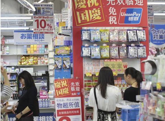 中国游客爆买,日本在人民币问题上服软