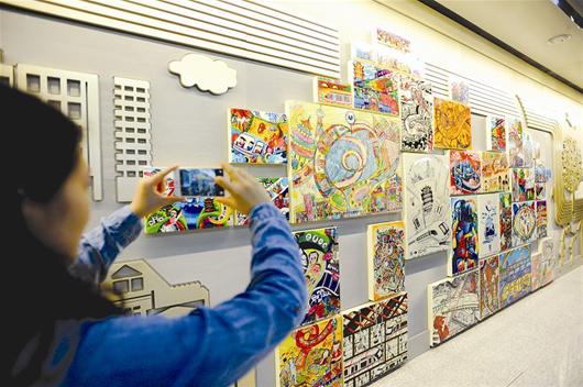 图为:地铁3号线市民之家站,百幅儿童梦想画描绘未来城市和乘坐地铁的