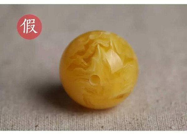图解蜜蜡和塑料的区别