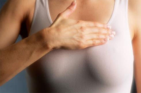 周期性月经前期乳房胀痛,乳房摸到多个结节状肿块,圆形,较硬的结节