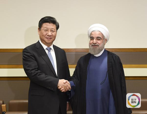 2015年9月28日,习近平主席在纽约联合国会见伊朗总统鲁哈尼。(新华社记者李学仁摄)