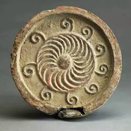 葵纹瓦当/先秦 葵纹是植物纹的变形,从所谓的水纹变化而来,谓以合秦