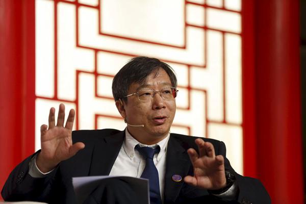 易纲表示，相信人民币汇率会由更多地受短期预期影响向基本面回归。视觉中国 图