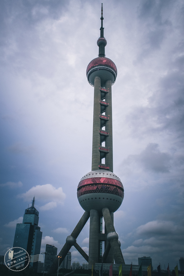 上海:一个打扮的时髦女人,妩媚有教辅-搜狐旅中标深圳市高中韵味图片