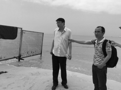 钢丝网左侧百米左右就是3人溺亡地。遇难者家属称,事发时并没有这些钢丝网,也没看到警示标志。京华时报记者张淑玲摄