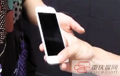 张女士现在使用的iPhone 6备用手机。 本报记者 雷键 翻拍