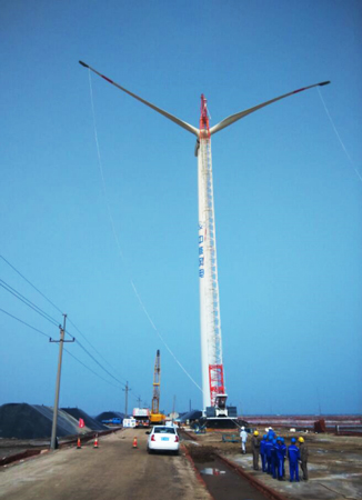 【图】中核集团潍坊滨海二期项目首台风机吊装