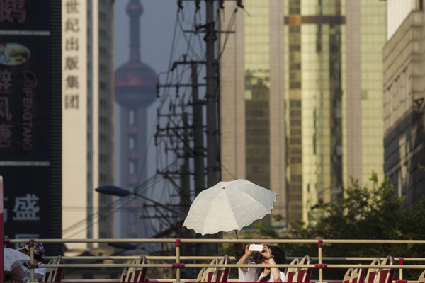 上海最高气温达40℃ 只在周末发高温红警系误