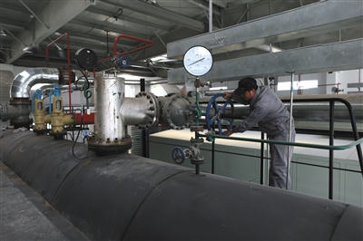 2014年，西罗园锅炉房燃煤锅炉改造成天然气锅炉。新京报记者 薛珺 摄