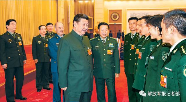 2013年3月11日,中共中央总书记、中共中央军委主席习近平出席十二届全国人大一次会议解放军代表团全体会议并发表重要讲话。解放军报记者乔天富 摄