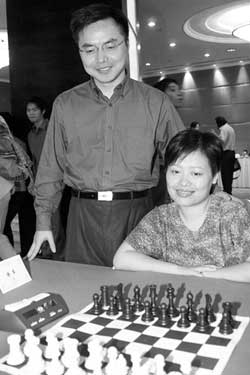 国际象棋冠军谢军老公图片