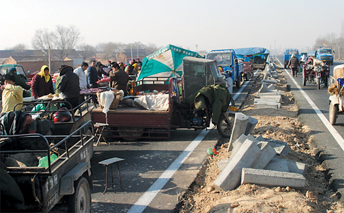 国内新闻 山东新闻 齐鲁晚报 12月15日,济南北郊大桥镇境内,这个熙熙