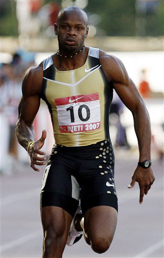 图文鲍威尔打破百米世界纪录鲍威尔急速奔跑