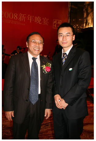 伊利高层与南方报业集团社长杨兴峰