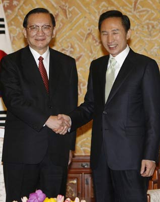李明博与中国国务委员唐家璇会面
