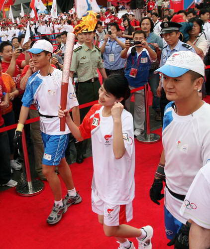 跳水世界冠军李娜起跑  奥运官网记者 王飞摄